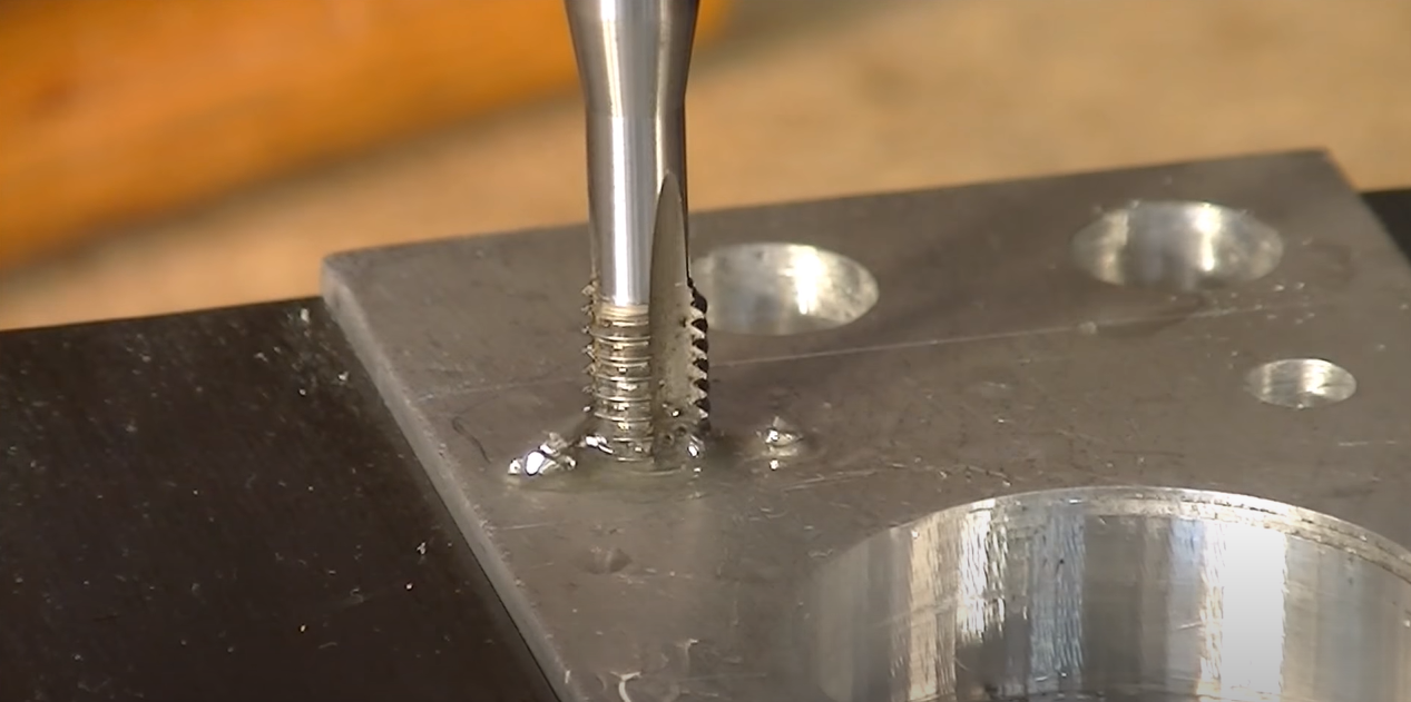 Nail inserted into metal hole