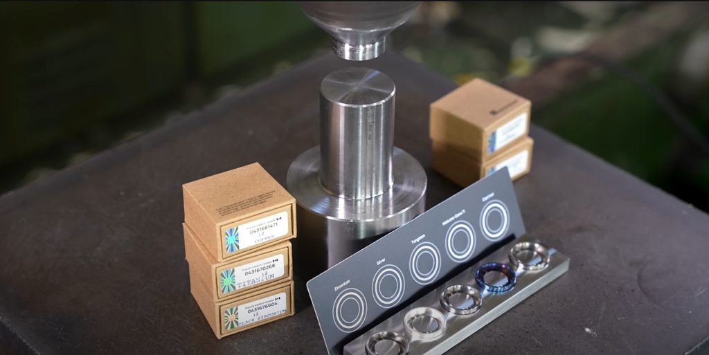 Hydraulic press with various metal rings in front