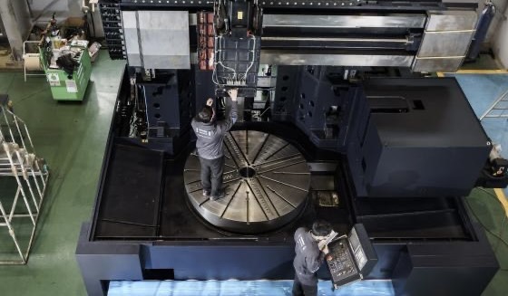 Man repairing a carousel machine, top view